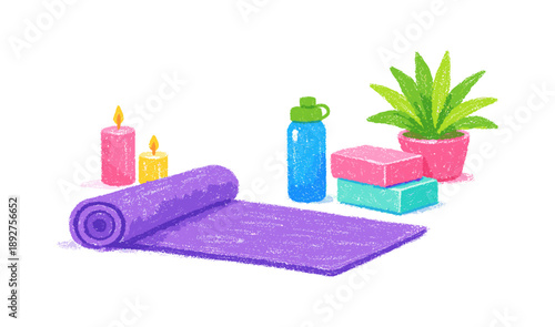 Colorful yoga accessories: mat, blocks, bottle, and candles for a tranquil practice