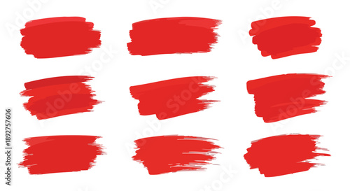 A collection of nine vibrant red brush stroke elements, presented on a clean white background.