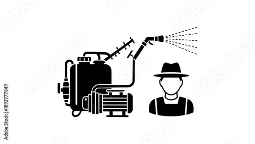 A man wearing a hat is spraying liquid from a machine