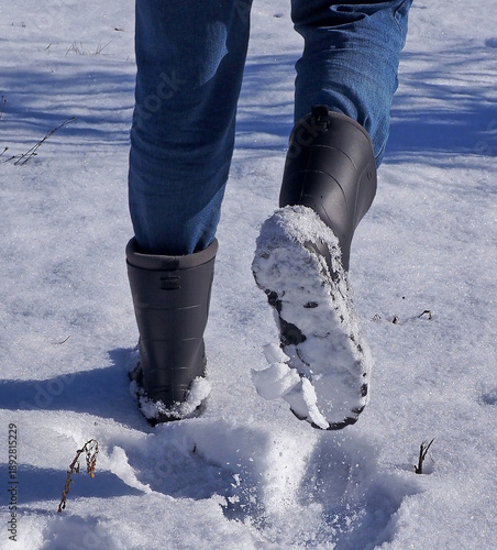 Rubber boots and snow