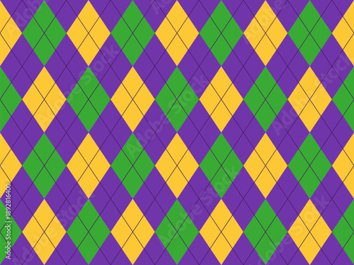 Seamless argyle diamond pattern in purple,  yellow and green. Geometric Mardi Gras colors seamless background for textile, wallpaper, and wrapping paper. 