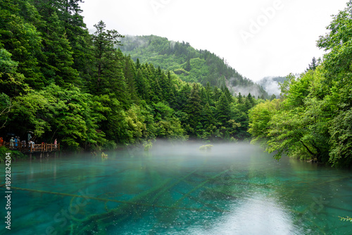 Tableau sur toile Beautiful scenic view of Peacock Lake on a rainy day in Jiuzhaigou Nature Reserve, China