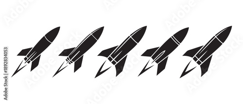 Black Rockets Launching Upward with Flame Trails, Isolated on White Background.