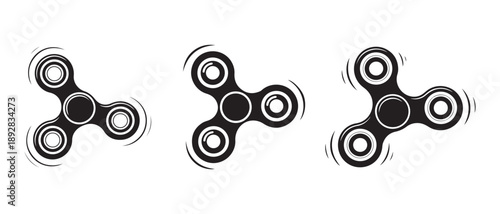 Spinning fidget toys in motion, isolated on white background.