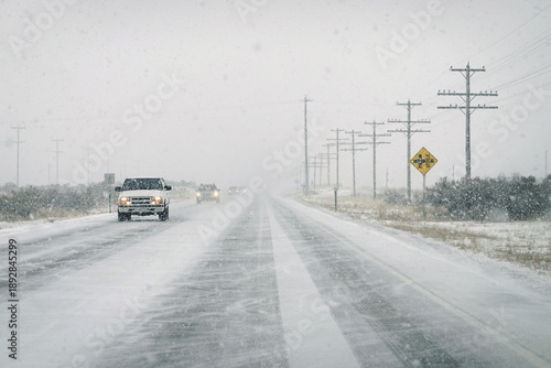 Winter Driving with Falling Snow Wintery Storm and Slick Driving