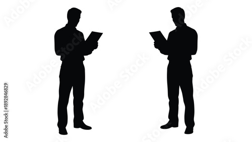 Two silhouetted figures both men are shown reading documents high quality