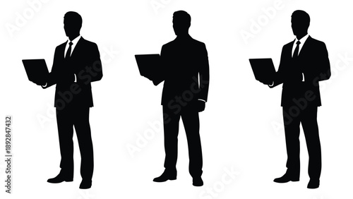 Three silhouetted businessmen standing with laptops and clipboards high quality professional