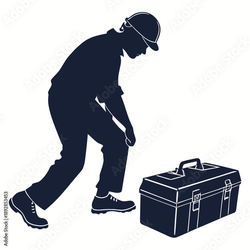 Worker bending over toolbox