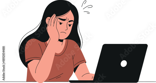 Woman sitting at a laptop looking puzzled or confused