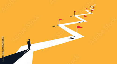 Businessman standing before a long winding path to goals