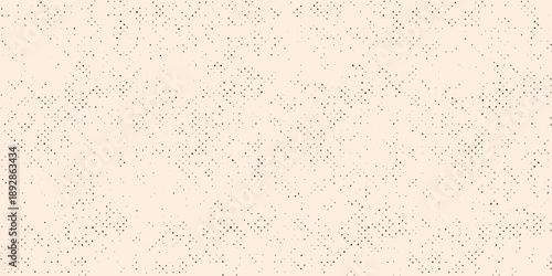 Pale peach textured background with scattered dark speckles