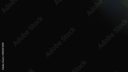 Elegant prism light leak overlay with chromatic aberration and soft rainbow lens flare effect for cinematic visuals