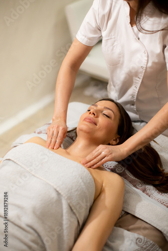 Woman receives massage ther...