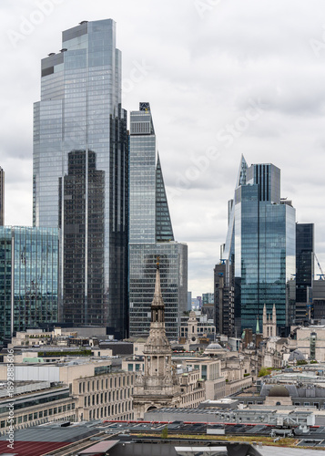 Panoramic view of London's financial district with iconic skyscrapers seen from the top of St. Paul's Cathedral