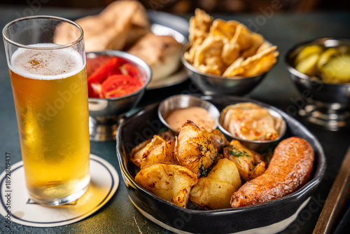 Sausage With Fried Potatoes And Beer