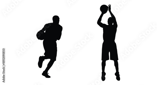 Two basketball players in action captured as a striking silhouette