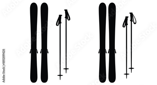 Two pairs of skis and poles a striking black silhouette