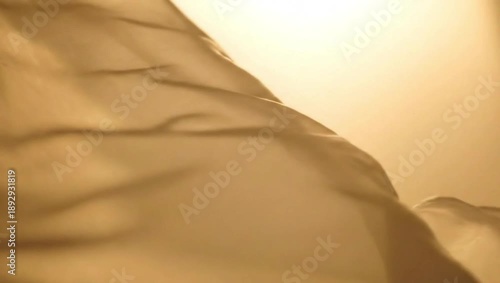 Ephemeral Sunlight: Capturing the essence of airy fabric dancing in the warmth of sunlight, creating a delicate interplay of light and shadow, evoking a sense of ethereal beauty.