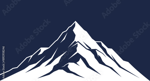 Majestic SnowCapped Mountain Peak Against Dark Sky.