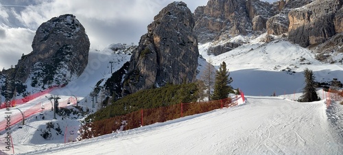 Snow‑covered ski slope in Cortina d’Ampezzo, Dolomites, Italy. Alpine winter scenery highlights sports, travel, and mountain tourism themes for versatile stock photography.