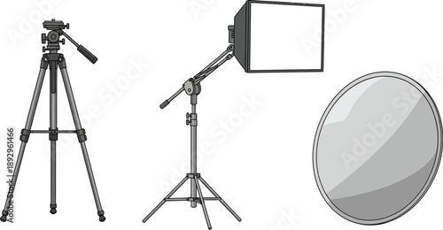Photography lighting equipment including a tripod, a softbox on a stand, and a circular reflector are displayed against a white background.