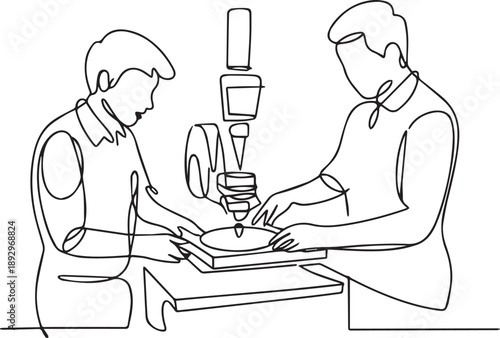 Two technicians collaborating on a precision drilling task in a workshop environment