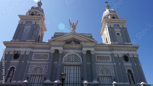 Colonial style facade of the roman catholic cathedral church building in the center of Santiago de Cuba