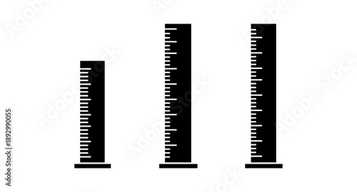 Three graduated cylinders of different heights with measurement markings on a white background