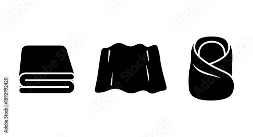 Set of three black icons representing folded towel, fabric swatch, and swaddled baby