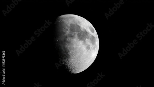 The Moon with its cratered surface illuminated on the right, showing a waxing gibbous phase. Concept Waxing Gibbous Moon, Cratered Moon, Lunar Surface Details, Night Sky Photography, Moonlit Portrait