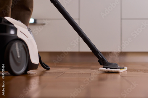Professional parqueting cleaning visuals, Ecofriendly vapor cleaning for wooden floors, Scene showcasing deep cleaning technology with vapor and steaming effect on wooden flooring