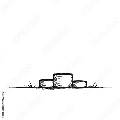 Simple outline of three cylindrical shapes on grassy ground  