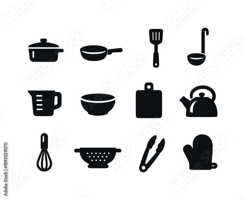 Black Kitchen Icons. Kitchenware. Solid icon set of kitchenware: saucepan, frying pan, spatula, ladle, measuring cup, mixing bowl, cutting board, kettle,