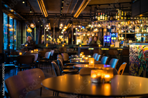 Chic Contemporary Restaurant Interior with Warm Ambient Lighting and Stylish Decor for a Perfect Dining Experience