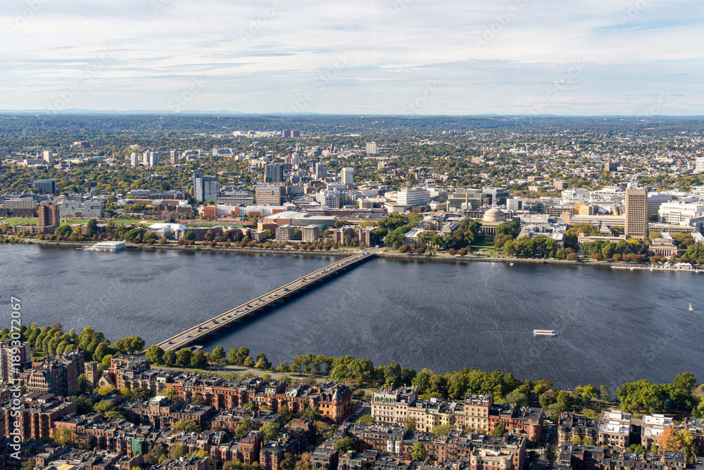 Obraz premium Panoramic aerial view of the Charles River with the Harvard Bridge connecting Boston and Cambridge in Massachusetts, USA