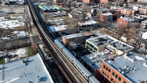 Cinematic 4K Drone Aerial Chicago West Side Flying Over CTA Green Line 'L' Train Tracks in Garfield Park