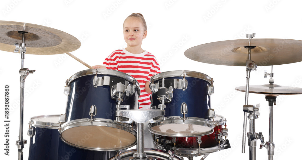 Fototapeta premium Little girl learning how to play drums on white background
