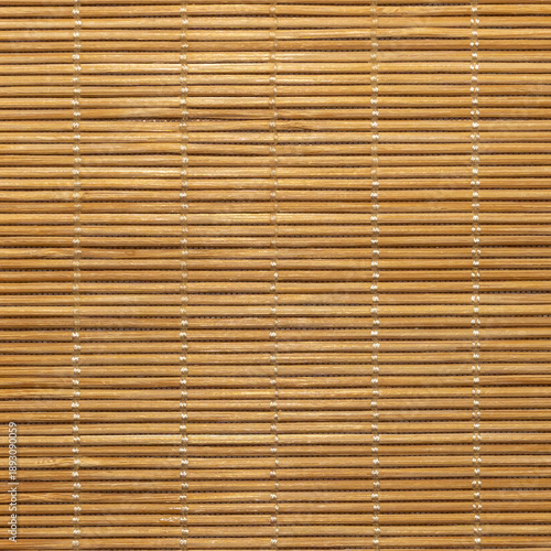 Bamboo mat texture with horizontal wooden slats and thread bindings. Natural woven surface background. Asian style eco material concept forFlat lay composi