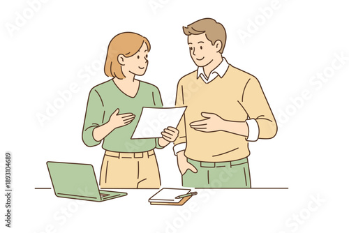 Colleagues collaborating on a shared task, standing side by side and exchanging thoughts with gentle gestures