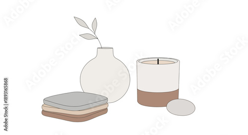 Minimalist home decor: vase, candle, stones, and folded cloths
