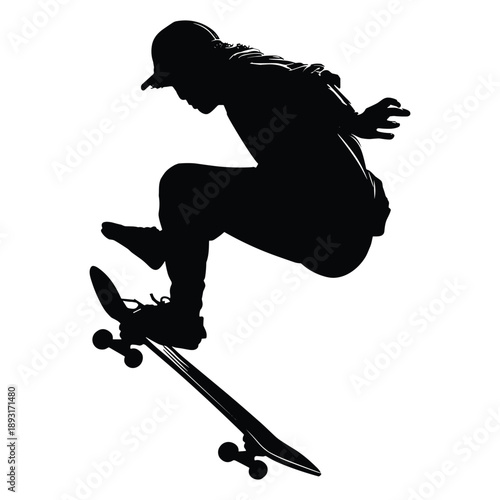 Silhouette of skateboarder performing jump trick