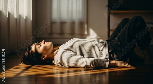 Woman Lying on Floor Experiencing Emotional Release Seeking Mindfulness And Inner Peace