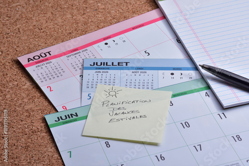Calendar pages of June, July and August with a note in french about summer vacation planning