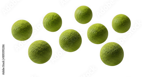 green limes on white background