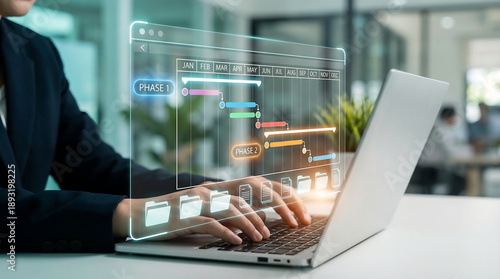 Foto Person using a laptop to manage project phases and tasks on a digital Gantt chart, representing effective project planning and execution