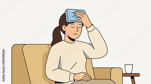 Woman sitting on couch with cold compress on forehead at home  