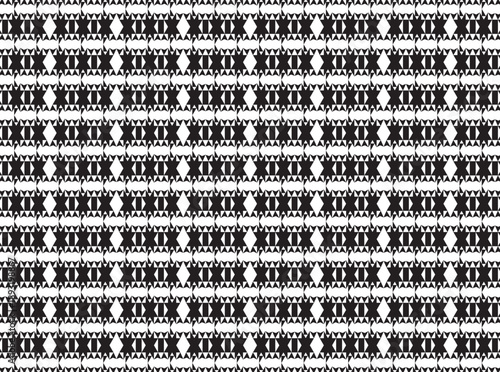 Seamless black and white geometric ethnic pattern with repeating ornamental shapes. Abstract tribal background featuring rhythmic symmetry, contrast elements, and decorative motifs. 
