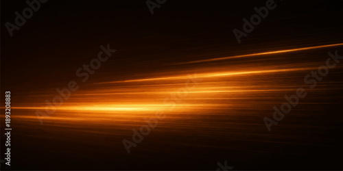 A beautiful orange sunrise reflects over the blue sea as the bright sun rises through a colorful cloudscape of red and yellow fire during a summer evening dusk