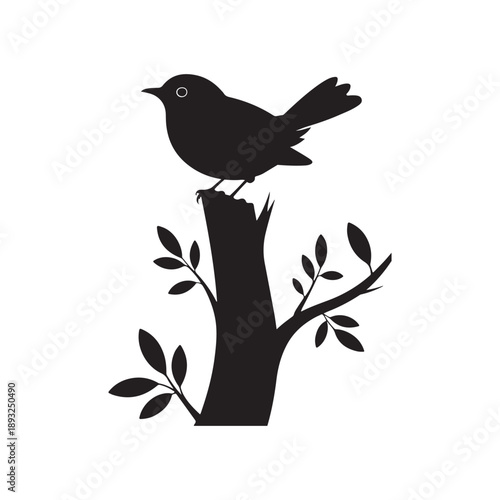 Black bird perched on a tree stump silhouette