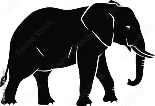 A majestic elephant walking alone in the wild, viewed from the side with a calm demeanor and detailed features